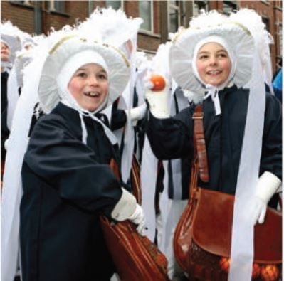 Children enjoying Binch Carnival in Belgium